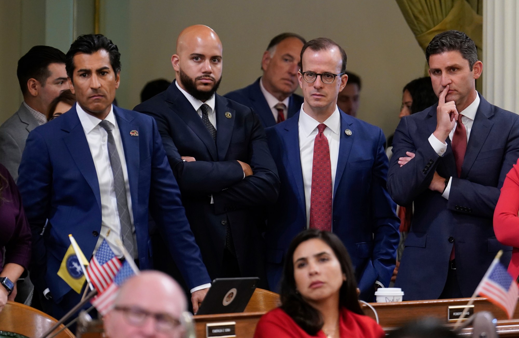 California Assembly Speaker Robert Rivas, left, along with fellow Democratic Assembly members Isaac Bryan, second from left, Marc Berman, third from left and Jesse Gabriel, right, during the Assembly session at the Capitol in Sacramento, Calif.., Thursday, Aug. 21, 2025. (AP Photo/Rich Pedroncelli)
