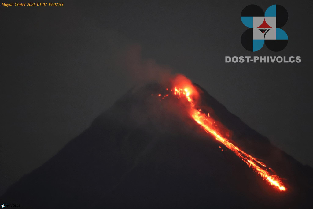 Lava flows from the crater of the Mayon volcano as alert level 3 remains raised in Albay province, north eastern Philippines