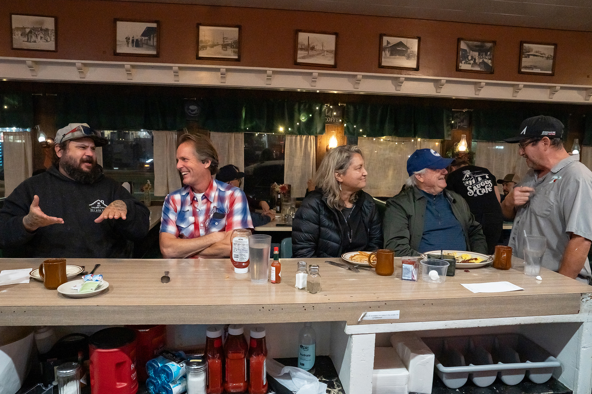 Customers sit at the counter and chat with one another at The Original Saugus Cafe on its final day of business in Saugus on Sunday, Jan. 4, 2026. But the new owners told a local radio station that the cafe would reopen under the same name after renovations. (Photo by Mark Savage, Contributing Photographer)
