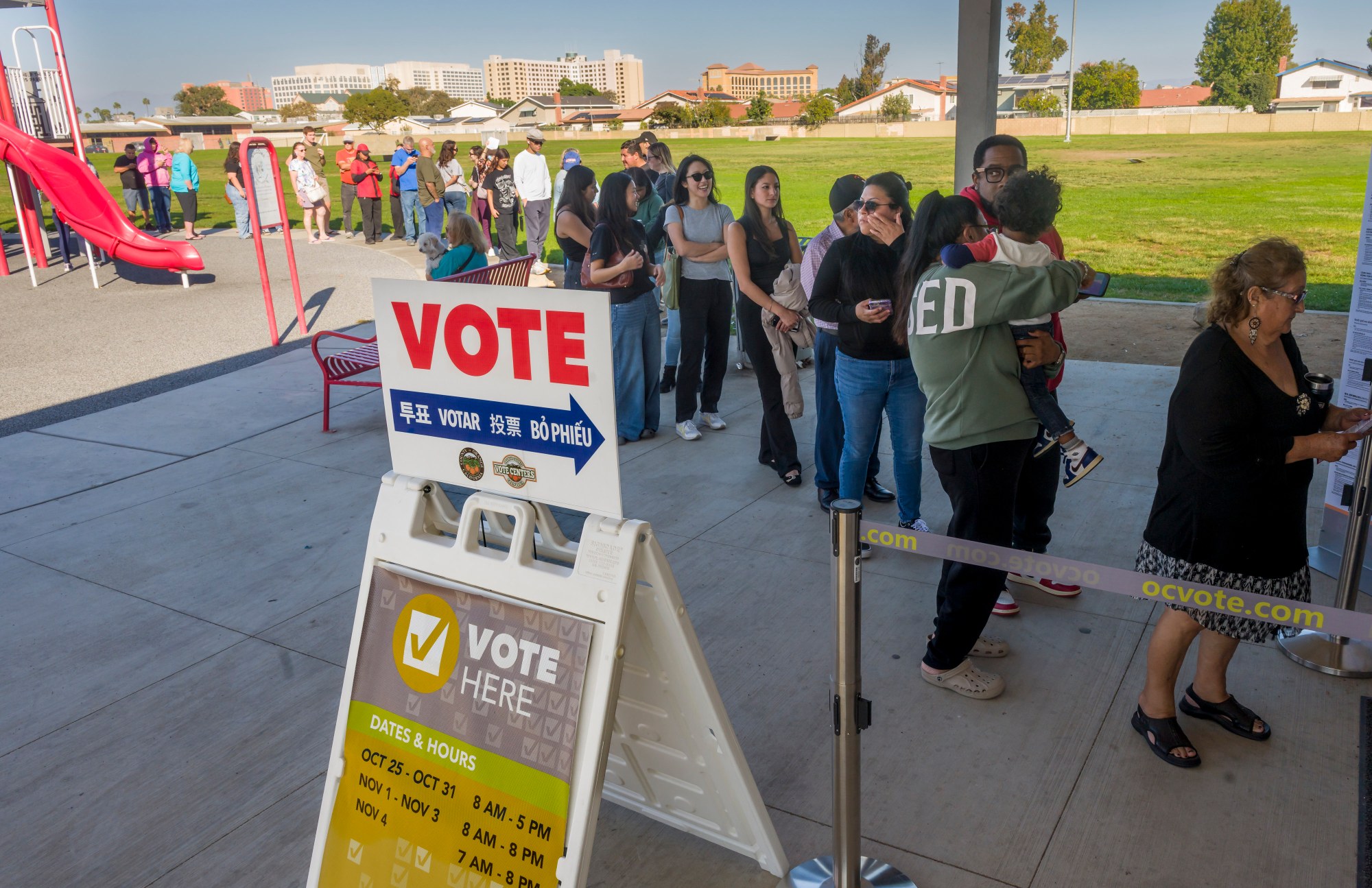 Voters stand in long lines to cast their ballots in the Proposition 50 special election on redistricting at the West Haven Park voting center in Garden Grove on Tuesday, Nov. 4, 2025. (Photo by Leonard Ortiz, Orange County Register/SCNG)
