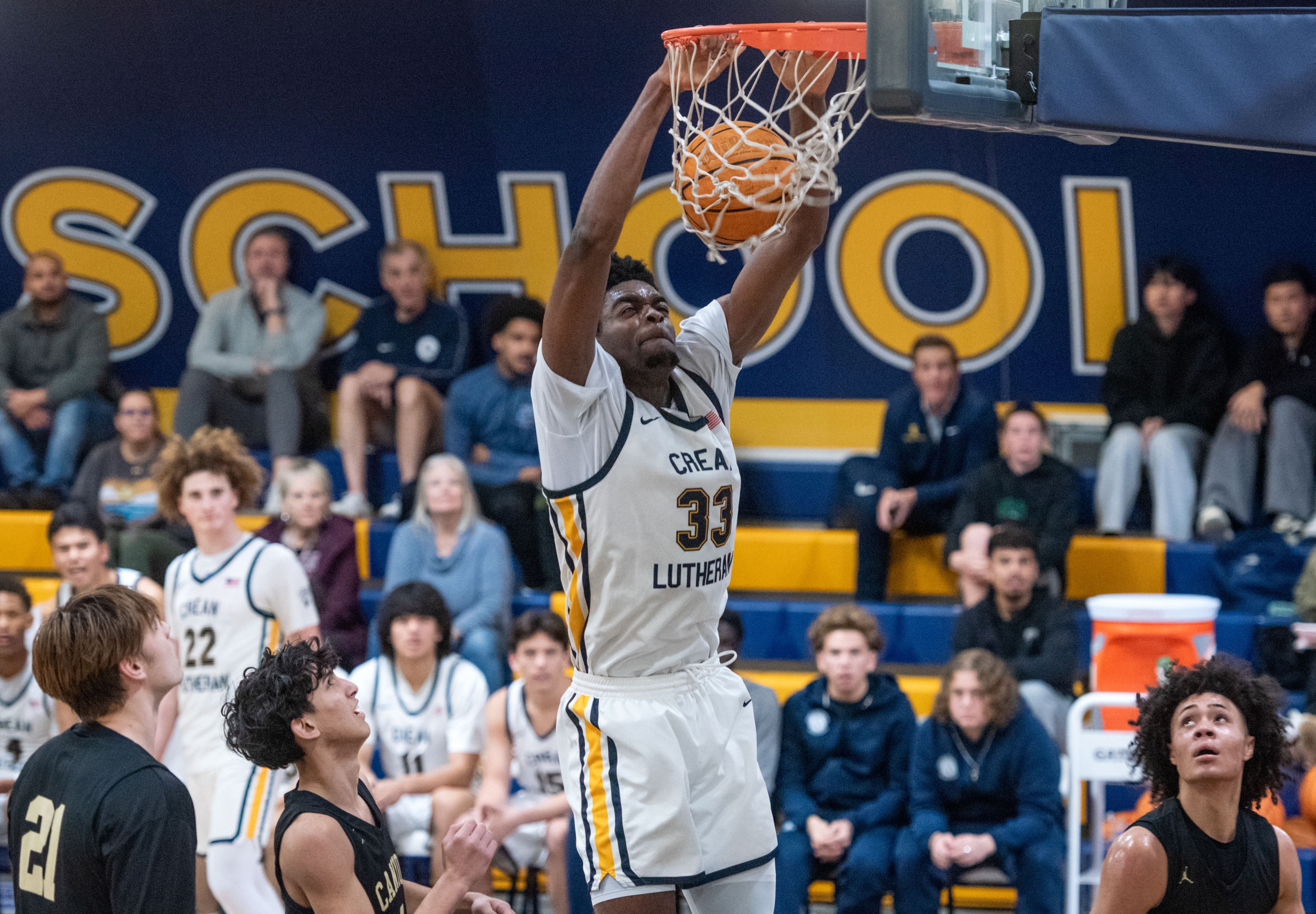 Crean Lutheran big man Chadrack Mpoyi dunks the ball during an 80-54 win in a Crestview League game against Cayon on Tuesday, January 6, 2026. (Photo by Jeff Antenore, Contributing Photographer)
