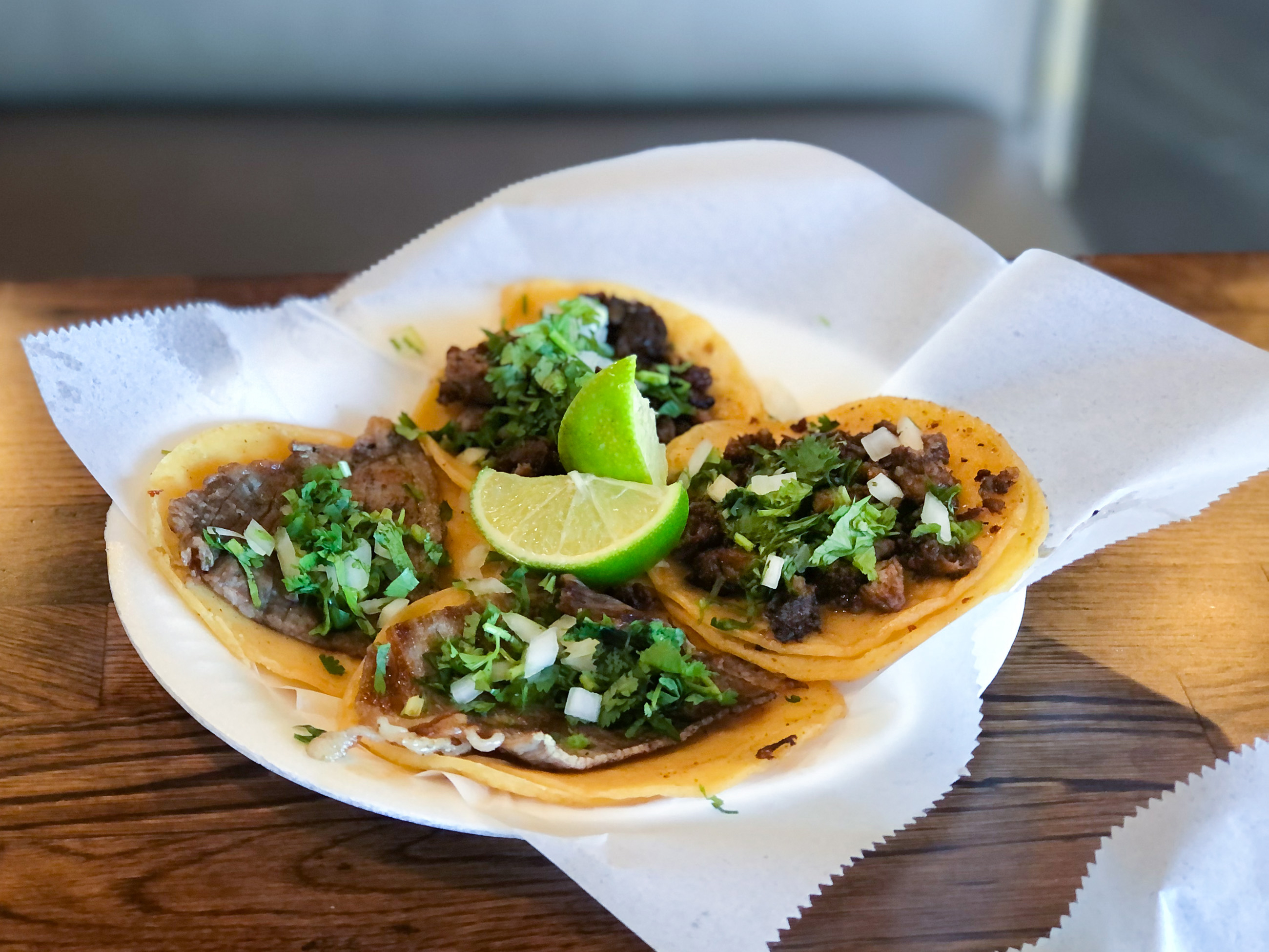 Cecina and arrachera tacos at Tacos Los Cholos in Fullerton...