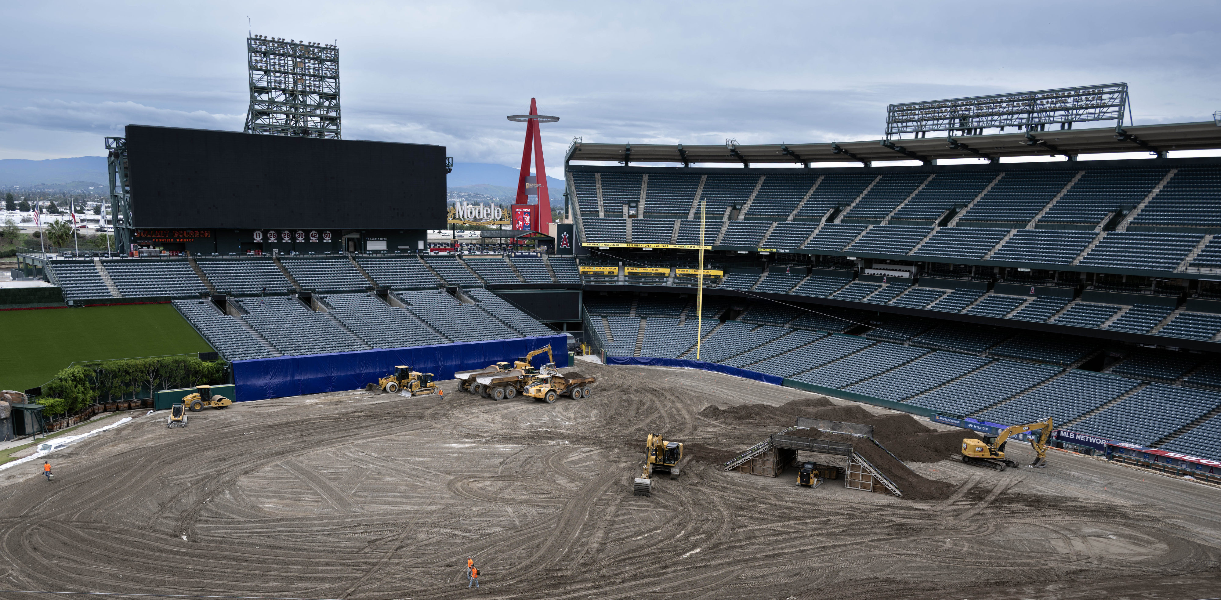 Heavy equipment bustles inside Angels Stadium of Anaheim on Tuesday, January 6, 2026 as workers transform the usual green baseball field into a dirt track as they prepare for Saturday’s AMA Supercross Championship series. (Photo by Mindy Schauer, Orange County Register/SCNG)
