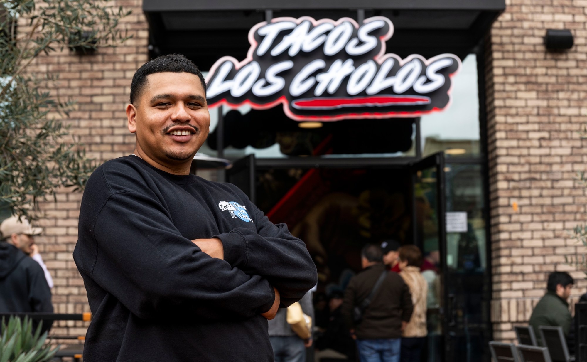 Josué Maldonado is a co-owner of Tacos Los Cholos in Santa Ana, CA. (Photo by Paul Bersebach, Orange County Register/SCNG)
